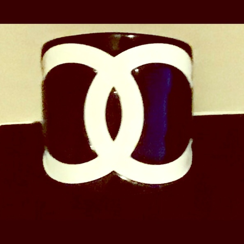 Coco Chanel black and white cuff bracelet.